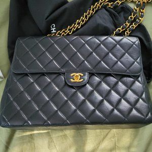 Black leather Chanel flap bag
